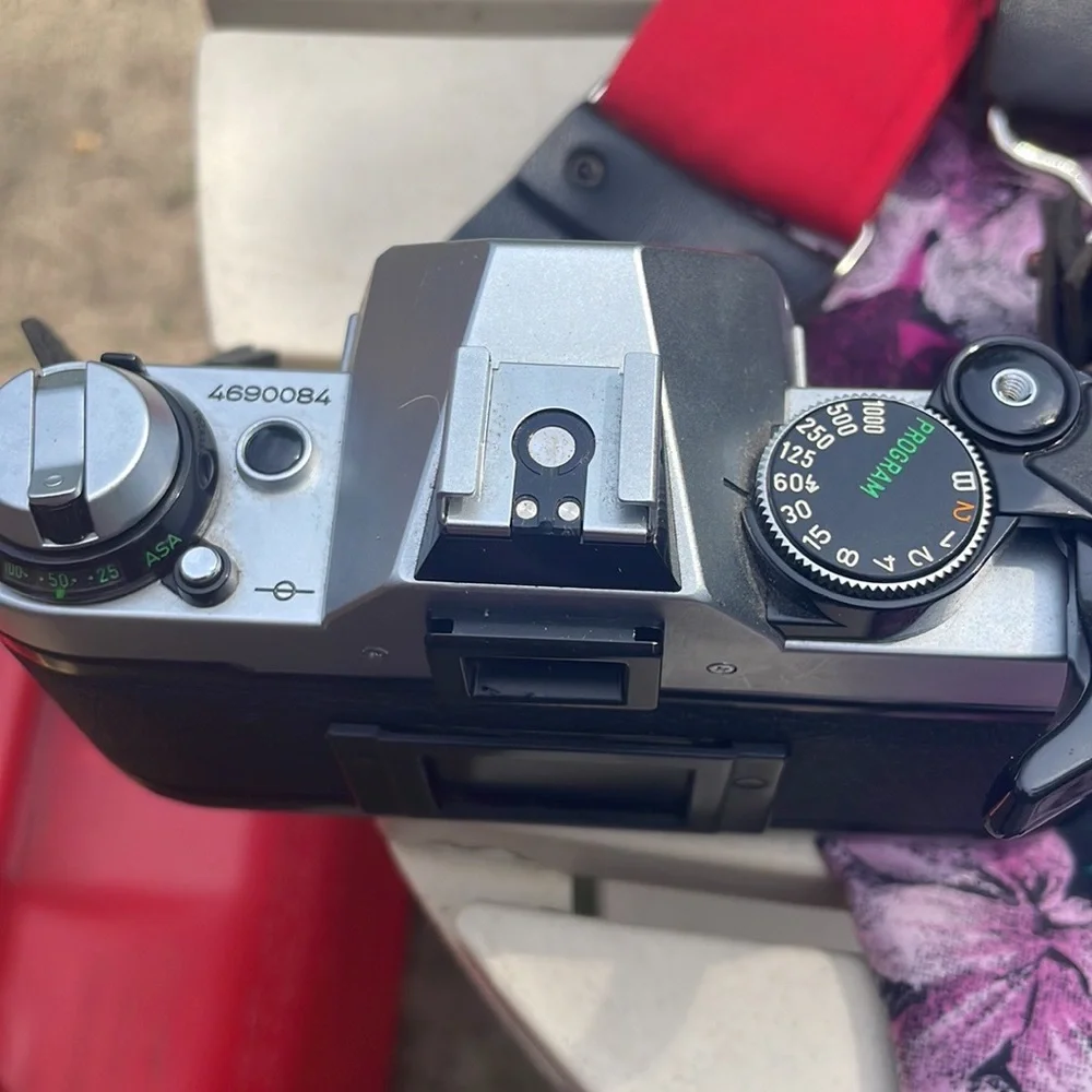 Canon ae 1 program camera with lenses and other accessories
